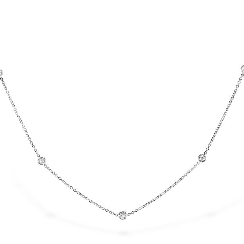 14 Karat White Gold Diamond-By-The-Yard Necklace Containing .25 Carat Total Weight Of 9 Bezel Set Round Brilliant Diamonds Si1 G, 18" In Length