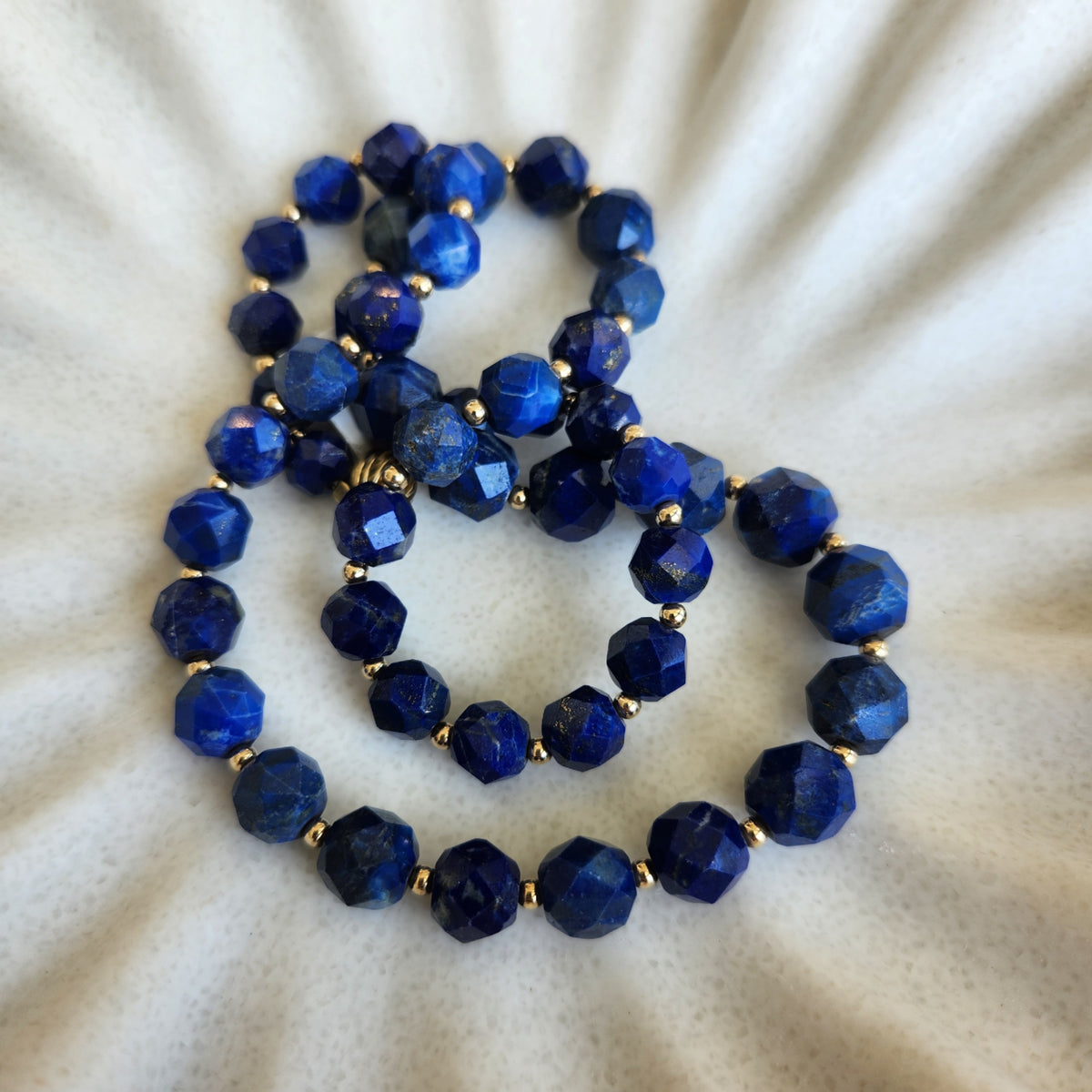 14 Karat Yellow Gold Faceted Lapis Bead Necklace, 22"
47 Beads = 7.5-