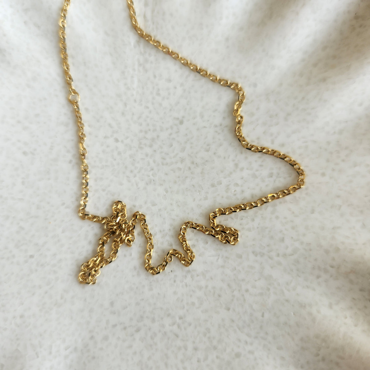 14 Karat Yellow Gold 18 Inch 1.5mm Diamond Cut Cable Chain With Loop At 16" For Adjustable Length And Lobster Claw Closure