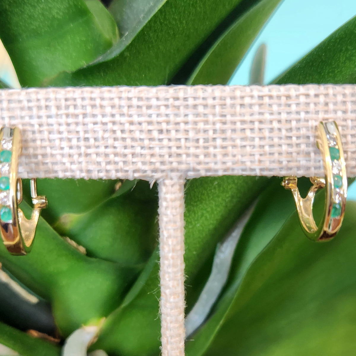 Vintage 14 Karat Yellow Gold Channel Set Diamond And Emerald Huggie Earrings With Omega Backs