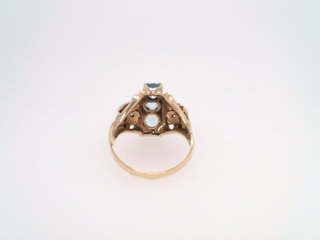 Vintage 14 Karat Yellow Gold Blue Topaz Ring With Floral Motif
