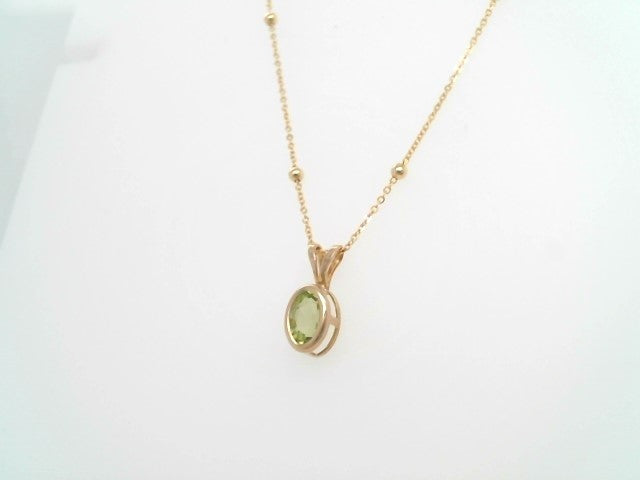 Vintage 14 Karat Yellow Gold Bezel Set Peridot Solitaire Pendant