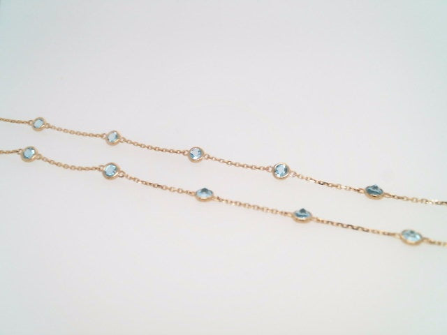 14 Karat Yellow Gold Bezel Set Blue Topaz "By The Yard" Style Necklace 18" With A Loop At 16" And 17" For Adjustable Length