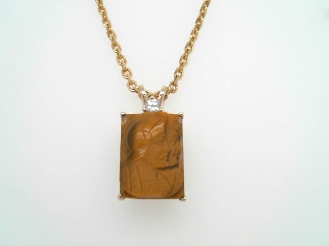 14 Karat Yellow Gold Rectangular Carved Tiger's Eye Inaglio Pendant With Diamond Accent