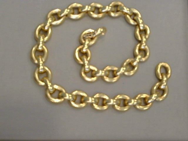 18KYG 18 inch oval fully rounded semi solid links connected by fully rounded half oval links with securing flat back design. Having fold over clasp with safety figure 8 clasp.