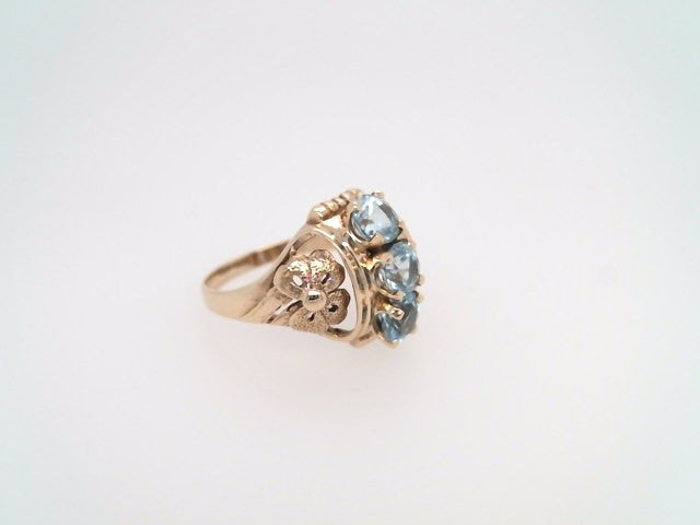 Vintage 14 Karat Yellow Gold Blue Topaz Ring With Floral Motif