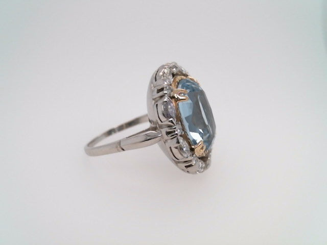 Vintage Platinum & 14 Karat Yellow Gold Oval Light Blue Synthetic Spinel Ring With Marquise & Round Brilliant Diamond Halo