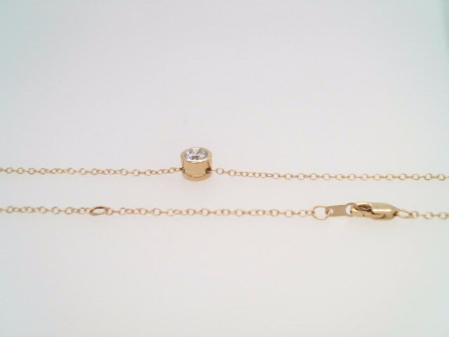 14 Karat Yellow Gold Round Brilliant Bezel Set Diamond Necklace With 1.3 Mm 16-18" Cable Chain