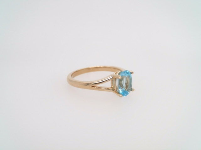 14 Karat Yellow Gold Blue Topaz Ring With Split Shank