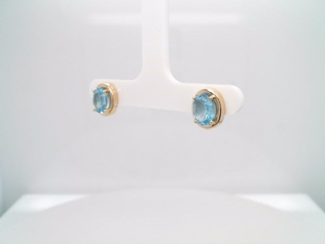 14 Karat Yellow Gold Blue Topaz Stud Earrings