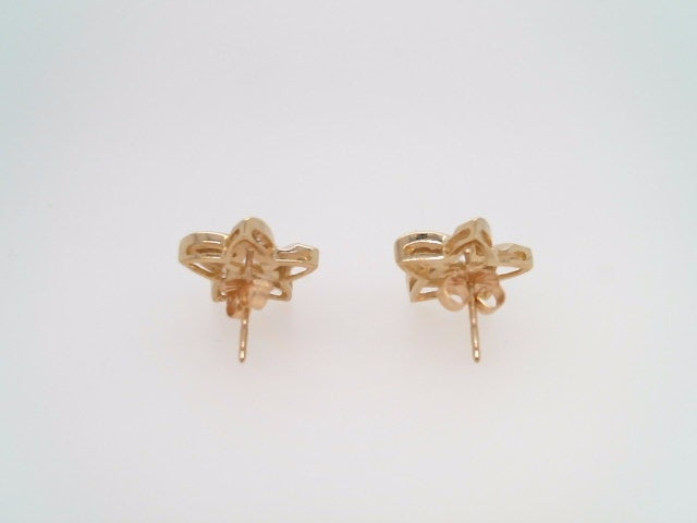 Vintage 14 Karat Yellow Gold Star Earrings With Tapered Baguette Diamonds