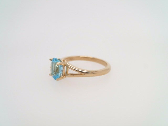 14 Karat Yellow Gold Blue Topaz Ring With Split Shank