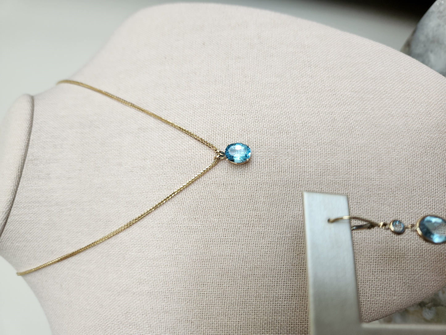 14 Karat Yellow Gold Oval Blue Topaz 4 Prong Set Solitaire Pendant