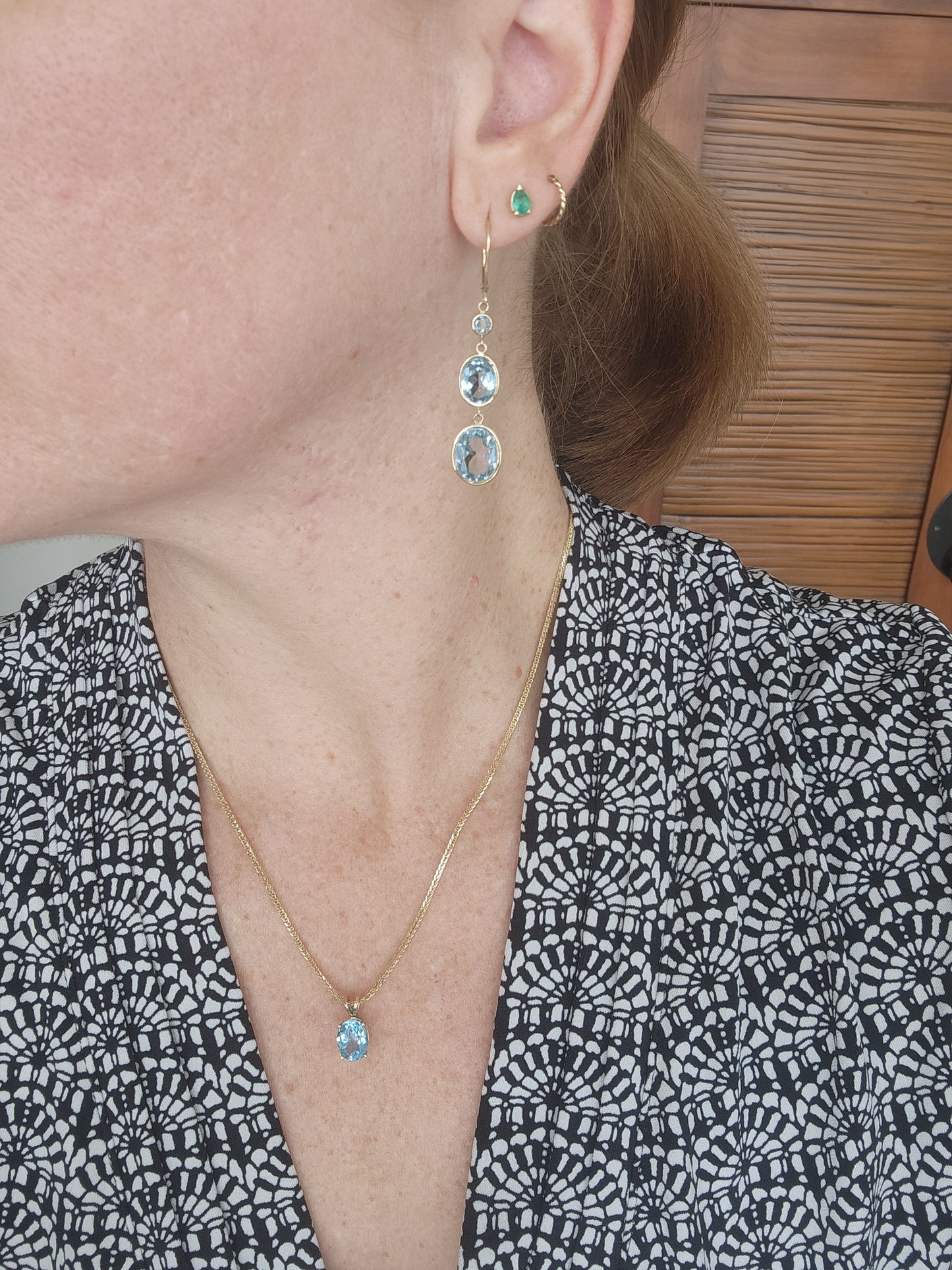 14 Karat Yellow Gold Oval Blue Topaz 4 Prong Set Solitaire Pendant