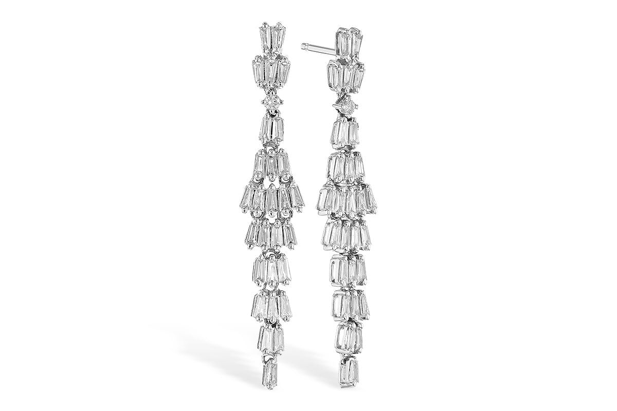 14 Karat White Gold Baguette Diamond Dangle Earrings Measuring 37 mm X 6 mm