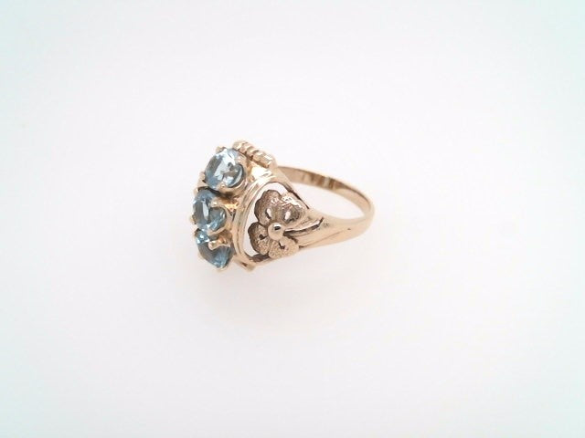 Vintage 14 Karat Yellow Gold Blue Topaz Ring With Floral Motif