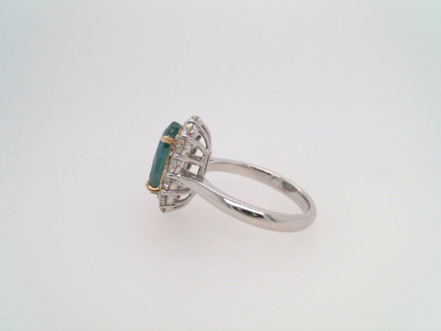 14 Karat White Gold Emerald & Diamond Halo Style Ring