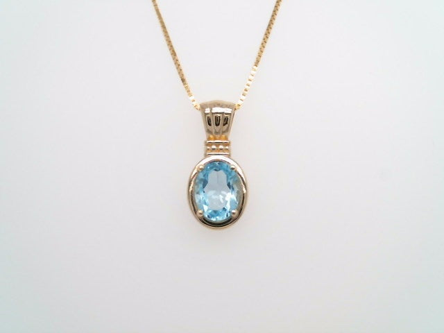 14 Karat Yellow Gold Blue Topaz Pendant With Beaded Detail