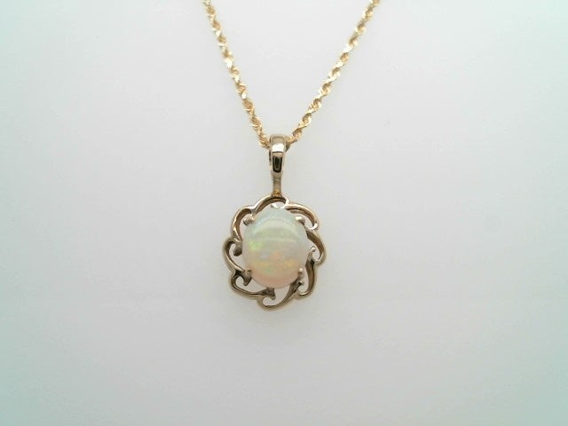 Vintage 14 Karat Yellow Gold Opal Pendant With Wave Design Frame