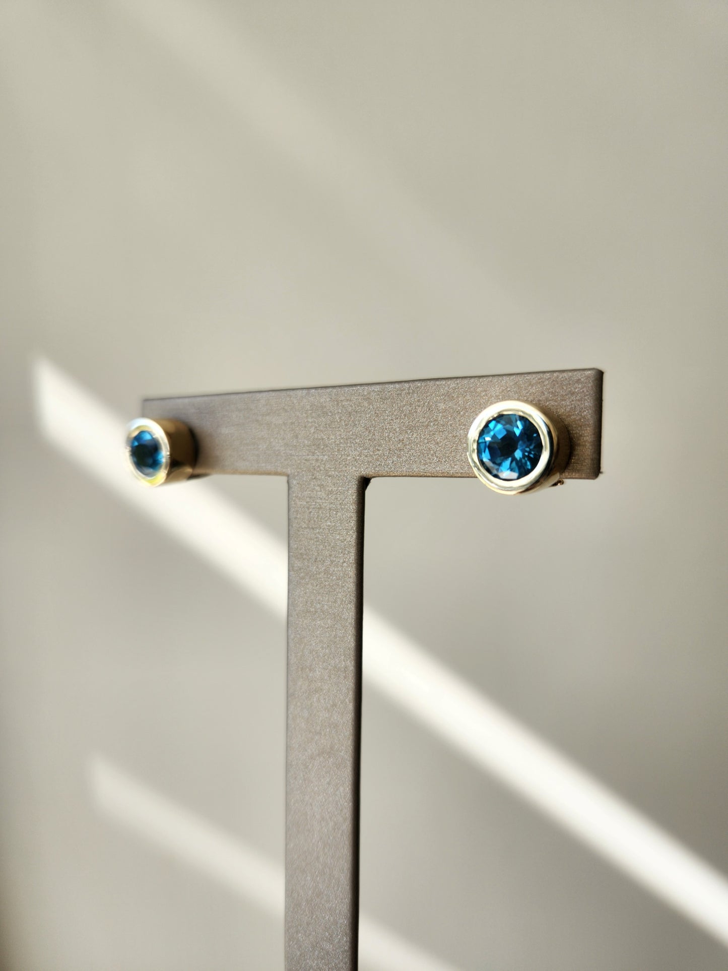 Vintage 14 Karat Yellow Gold Round Bezel Set Blue Topaz Earrings With Omega Backs