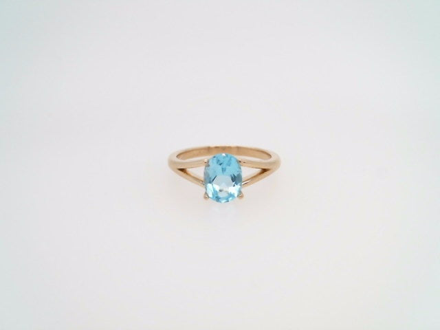 14 Karat Yellow Gold Blue Topaz Ring With Split Shank