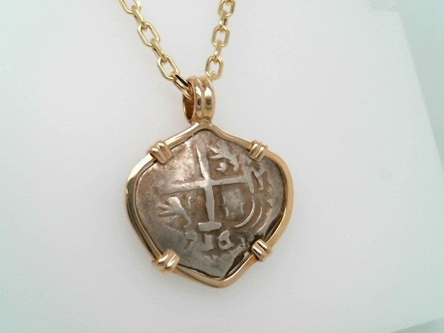 Silver 2 Reale Coin Prong Set In 14 Karat Yellow Gold Bezel Pendant
D