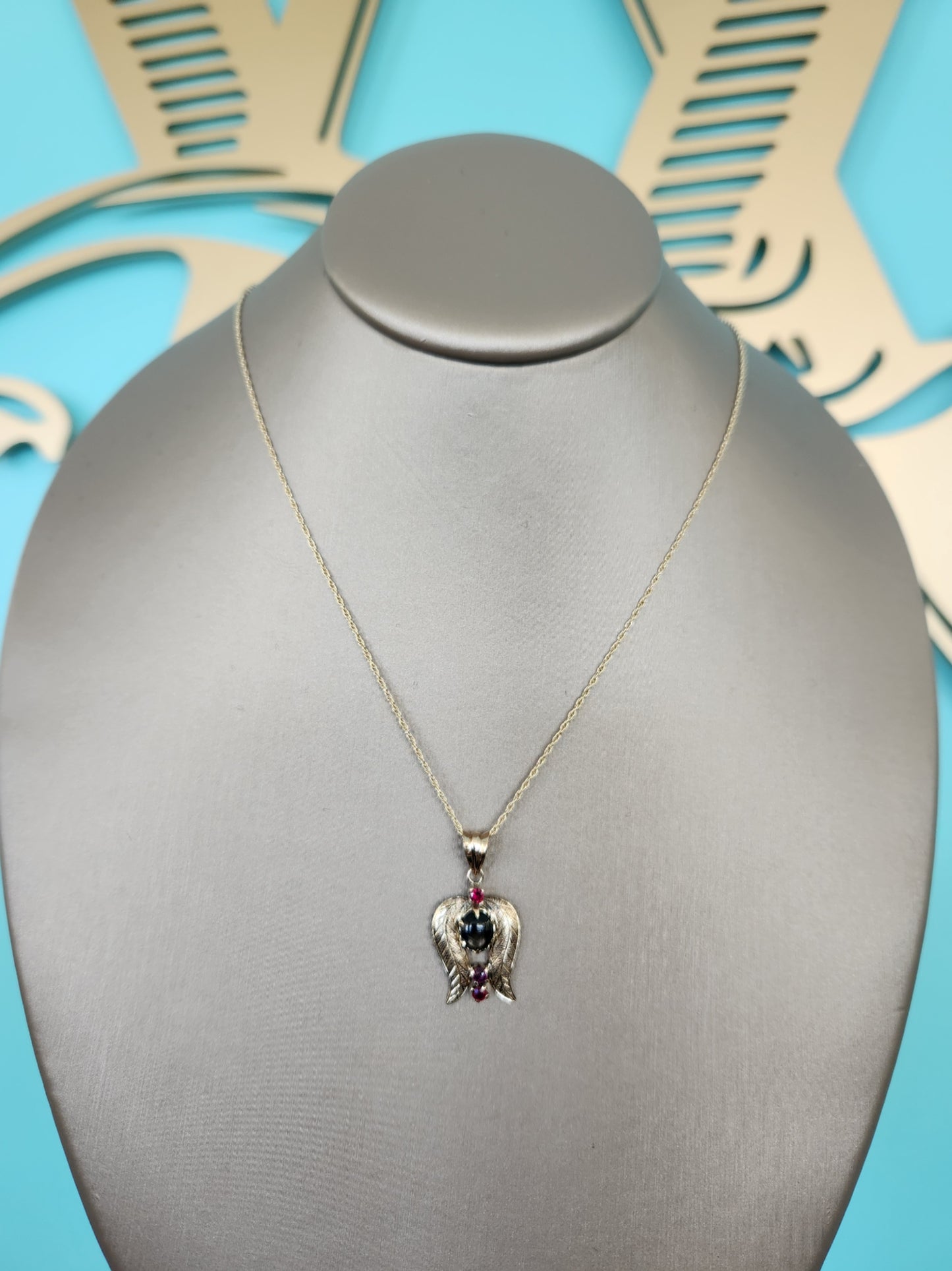 Vintage 14 Karat Yellow Gold Black Star Sapphire & Ruby Pendant With Leaf/Wing Motif