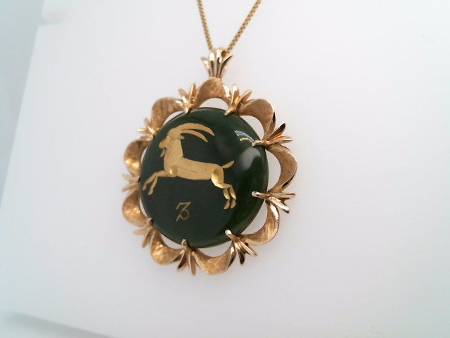 Vintage 14 Karat Yellow Gold 35 Mm Capricorn Zodiac Medallion Pendant With Dark Green Carved Jade Cabochon