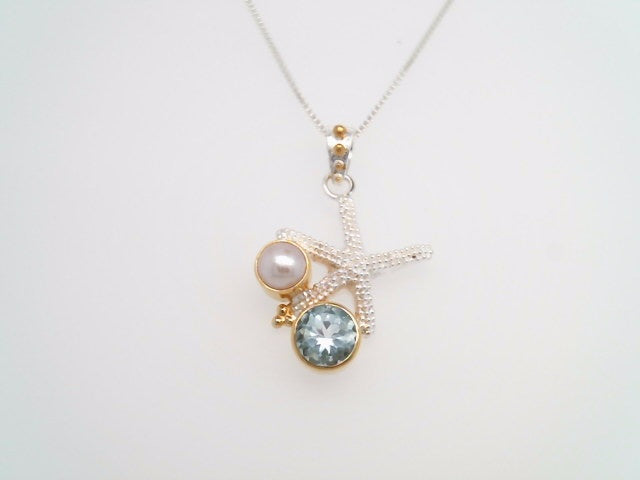 Sterling Silver And 22 Karat Gold Vermeil Starfish Necklace With 1 Round Sky Blue Topaz And 1 White Freshwater Pearl 18" Chain Included