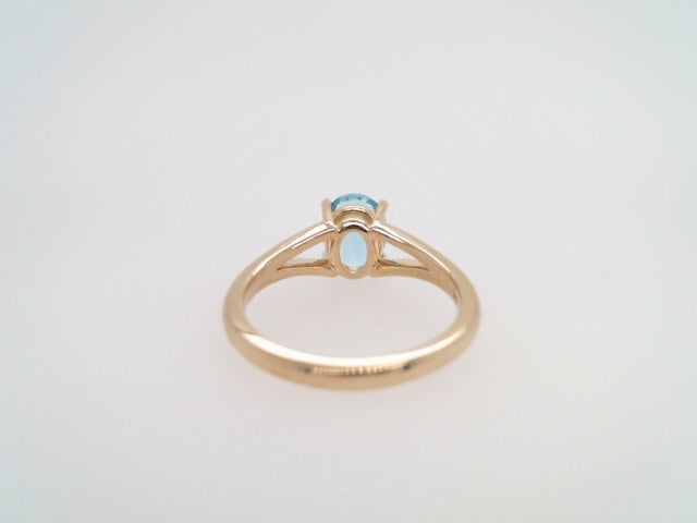 14 Karat Yellow Gold Blue Topaz Ring With Split Shank