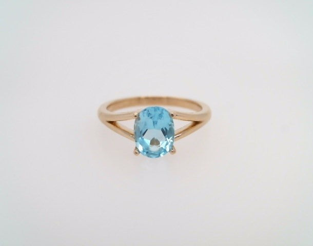 14 Karat Yellow Gold Blue Topaz Ring With Split Shank