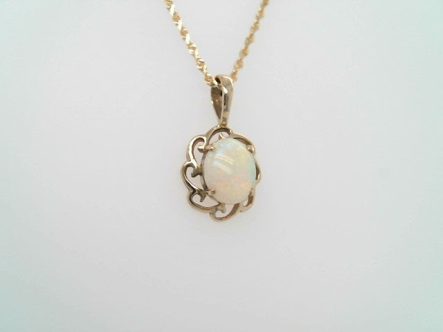 Vintage 14 Karat Yellow Gold Opal Pendant With Wave Design Frame