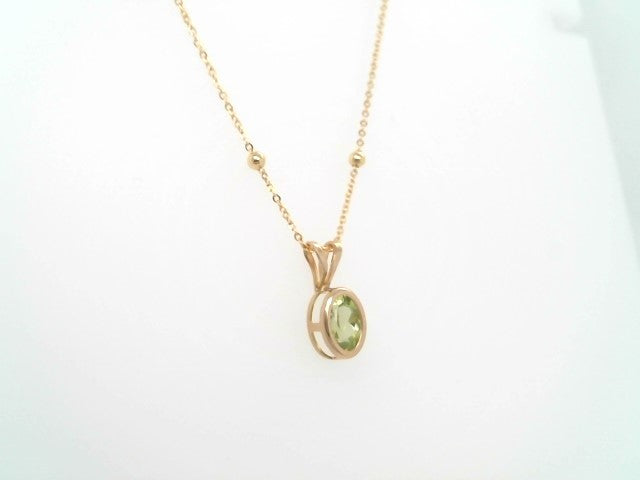 Vintage 14 Karat Yellow Gold Bezel Set Peridot Solitaire Pendant
