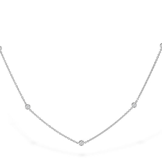 14 Karat White Gold Diamond-By-The-Yard Necklace Containing .25 Carat Total Weight Of 9 Bezel Set Round Brilliant Diamonds Si1 G, 18" In Length