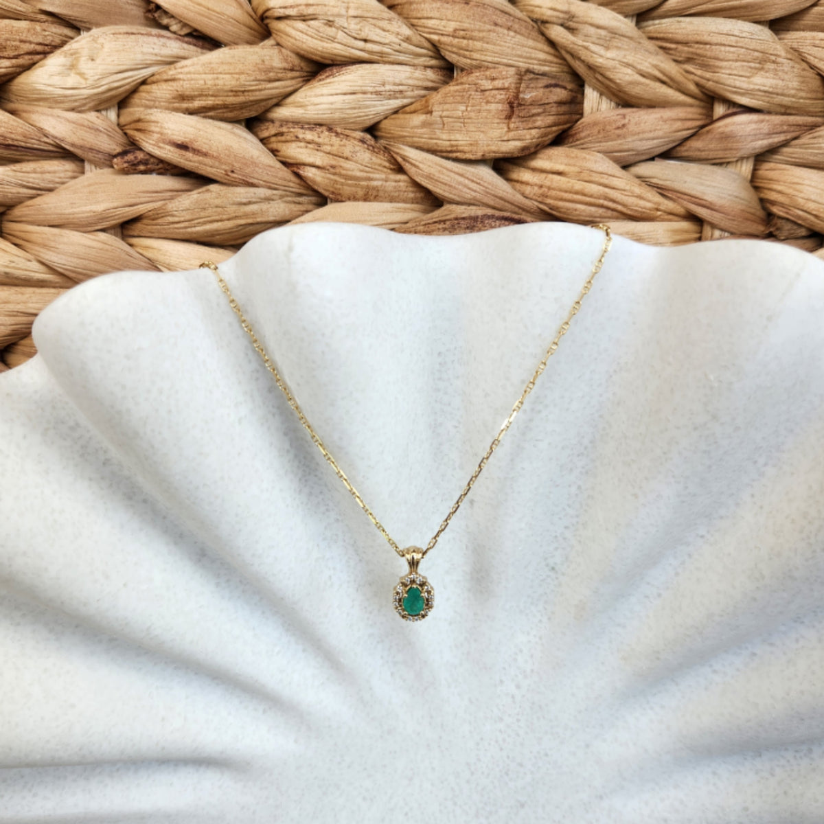 14 Karat Yellow Gold Pear Shaped Emerald Pendant With Diamond Halo