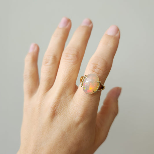 14 Karat Yellow Gold Split Shank Ethiopian Welo Opal Solitaire Ring