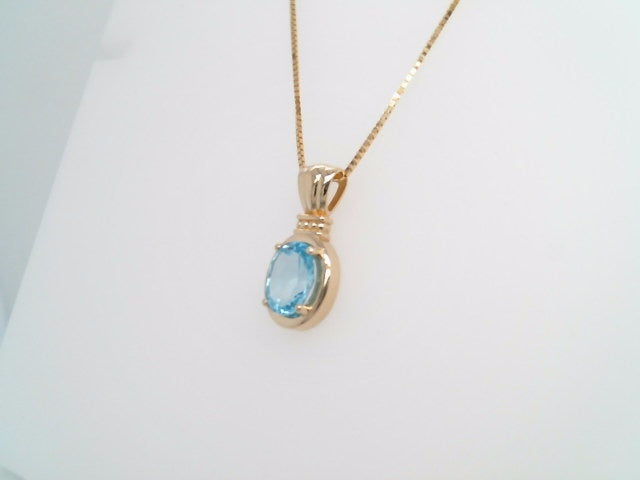 14 Karat Yellow Gold Blue Topaz Pendant With Beaded Detail