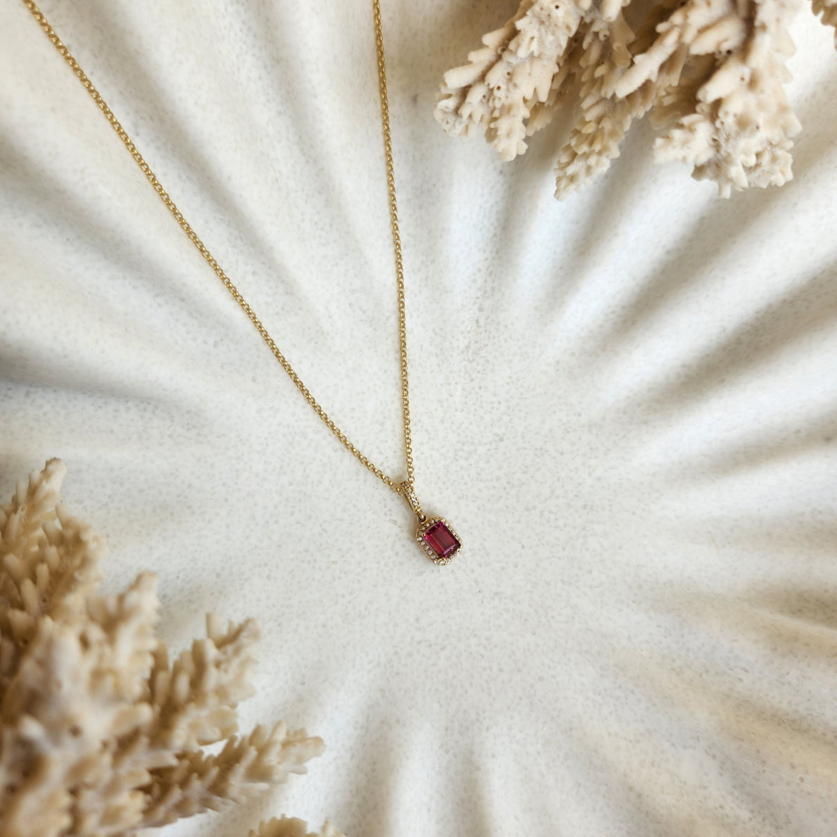 14 Karat Yellow Gold Emerald Cut Pink Tourmaline Pendant With Diamond Halo