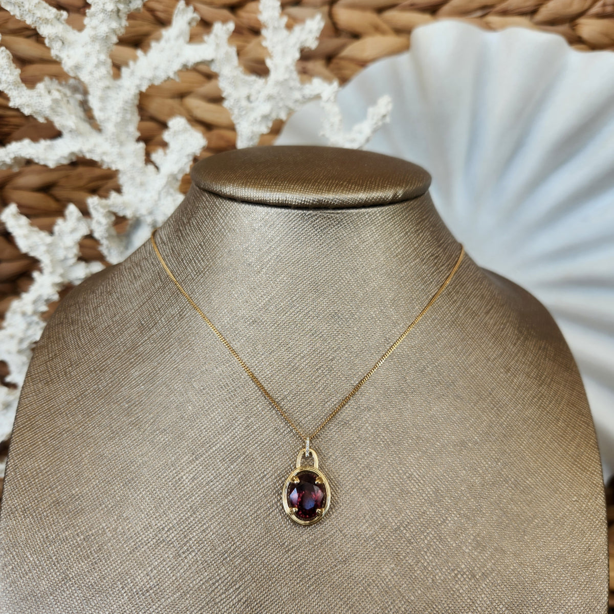 14 Karat Yellow Gold Color Change Garnet Pendant With Diamond Bail