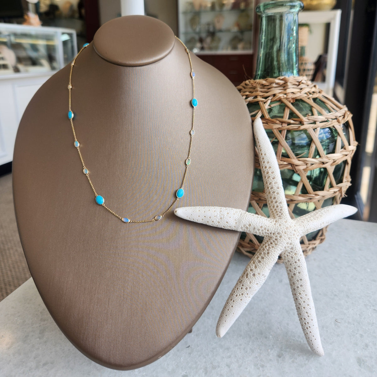 14K Yellow Gold Opal and Turquise Station Necklace (18 Inches)

Ston