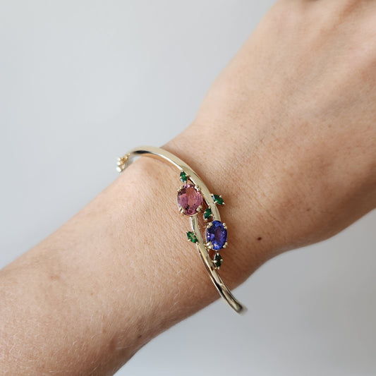 14 Karat Yellow Gold "Flora" Hinged Bangle Bracelet With Pink Tourmaline, Tanzanite And Tsavorites, 7"