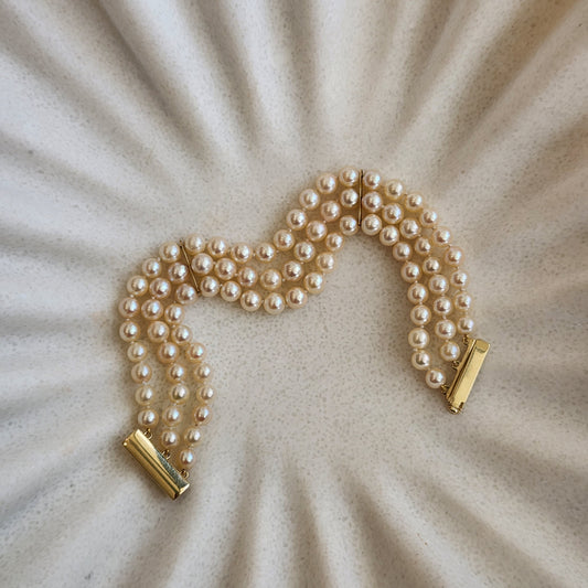 14 Karat Yellow Gold Triple Strand Akoya Cultured Pearl Bracelet, 7"