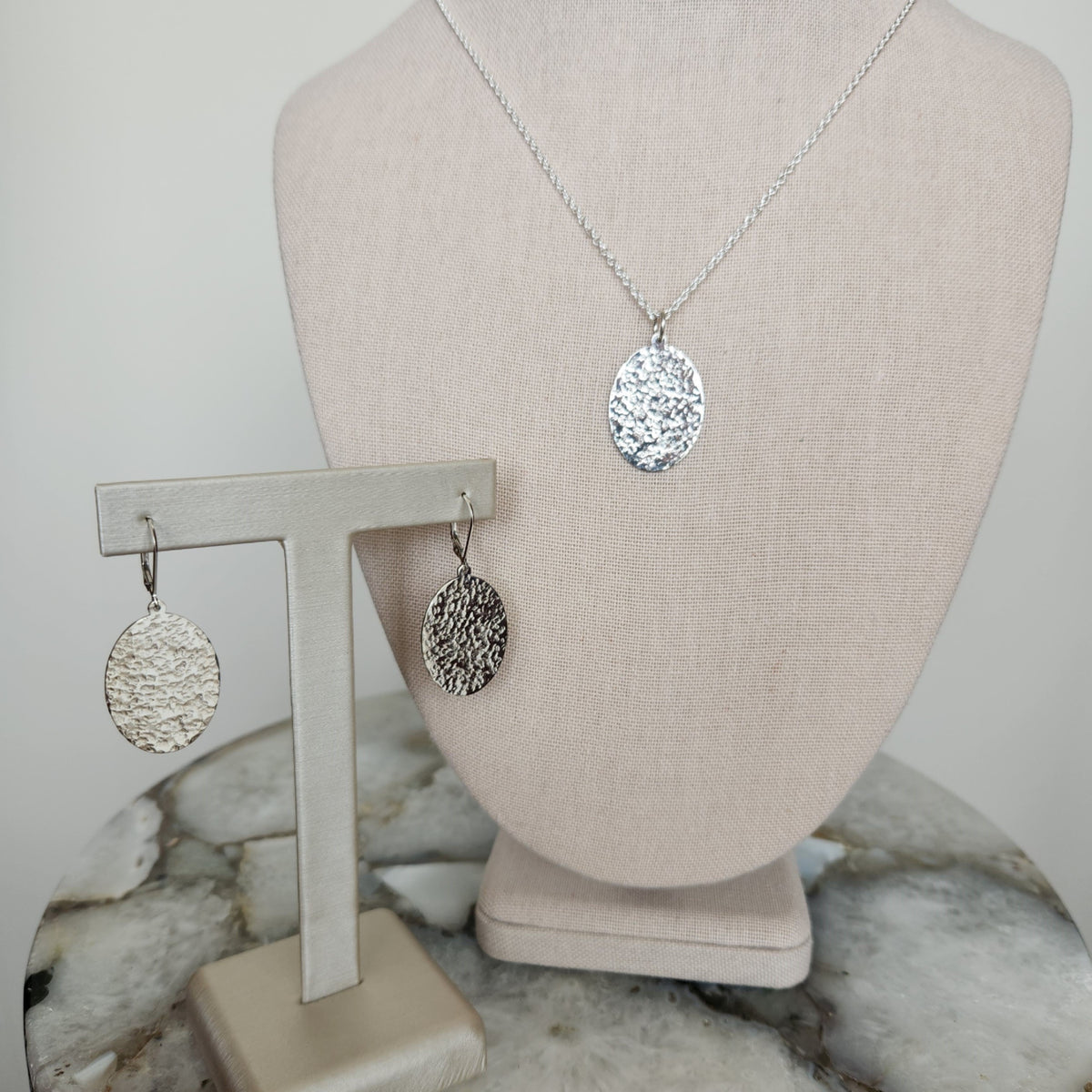 Sterling Silver Oval Dangle Earrings With Hammered Finish