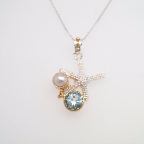Sterling Silver And 22 Karat Gold Vermeil Starfish Necklace With 1 Round Sky Blue Topaz And 1 White Freshwater Pearl 18" Chain Included
