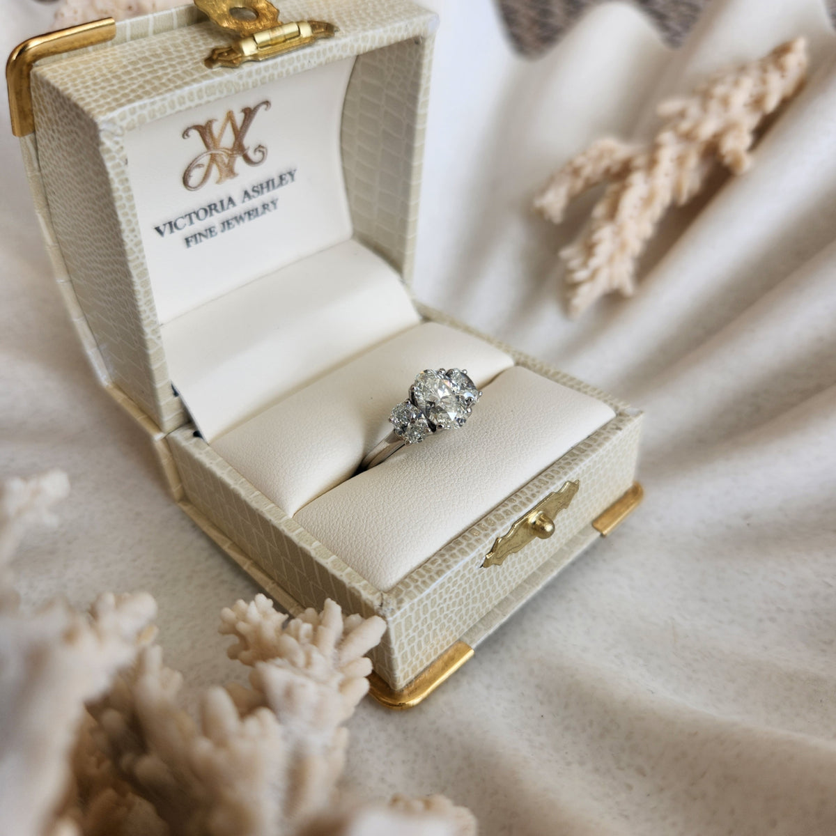 Platinum And Diamond Three Stone Engagement Ring.  
Center Oval 1.71C