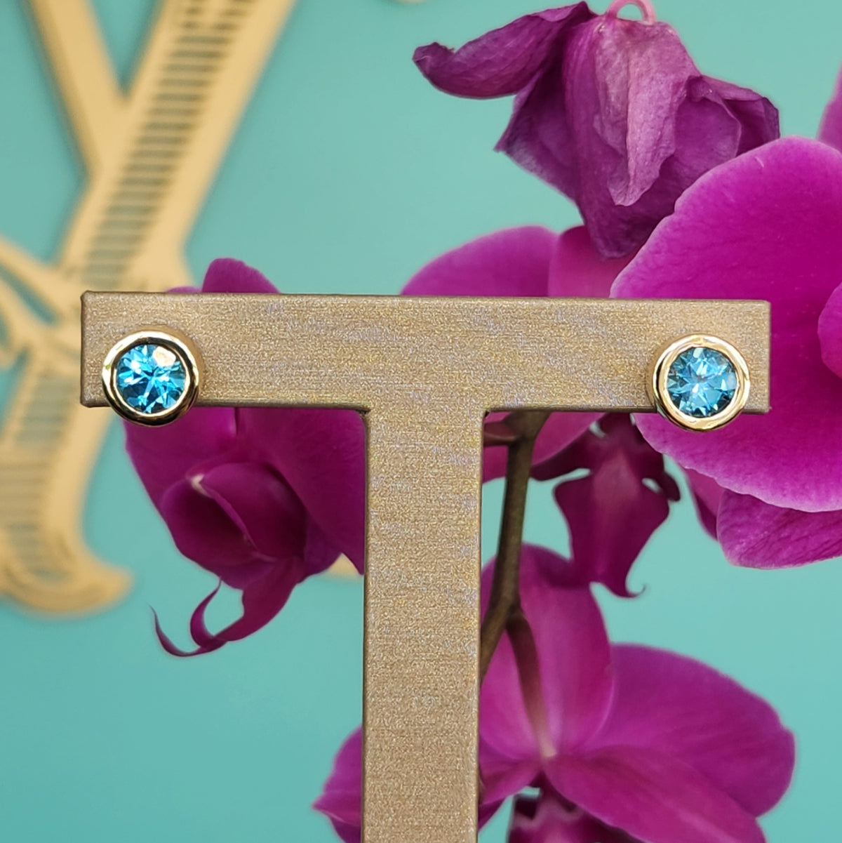 Vintage 14 Karat Yellow Gold Round Bezel Set Blue Topaz Earrings With Omega Backs