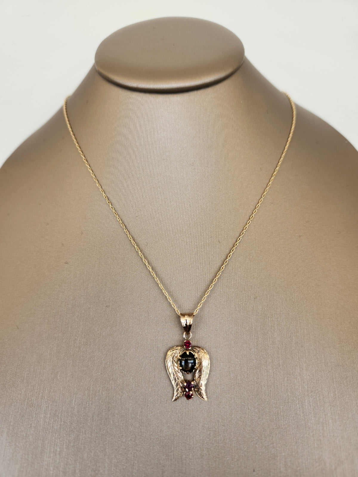Vintage 14 Karat Yellow Gold Black Star Sapphire & Ruby Pendant With Leaf/Wing Motif