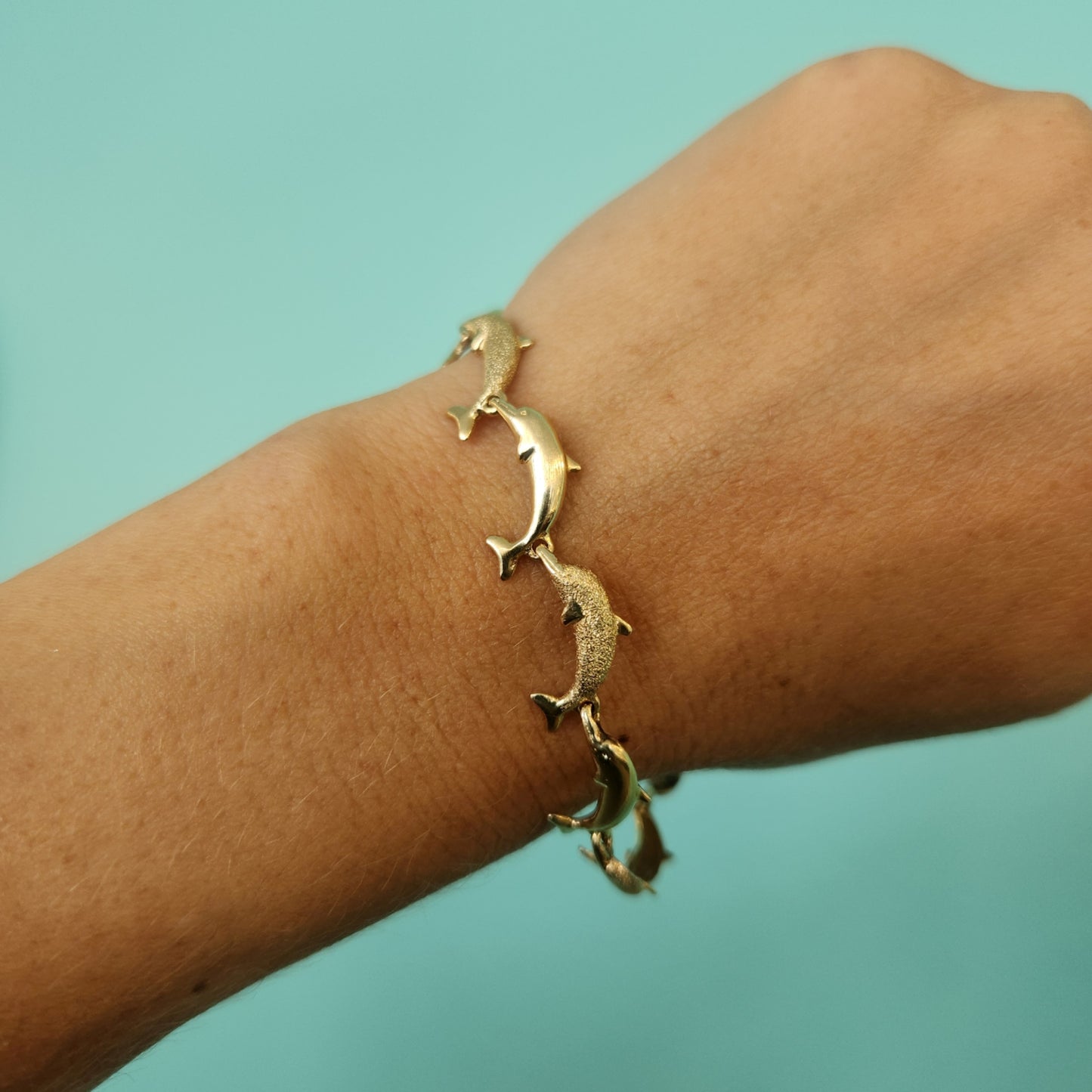 Vintage 14 Karat Yellow Gold Jumping Dolphins Bracelet, 7"