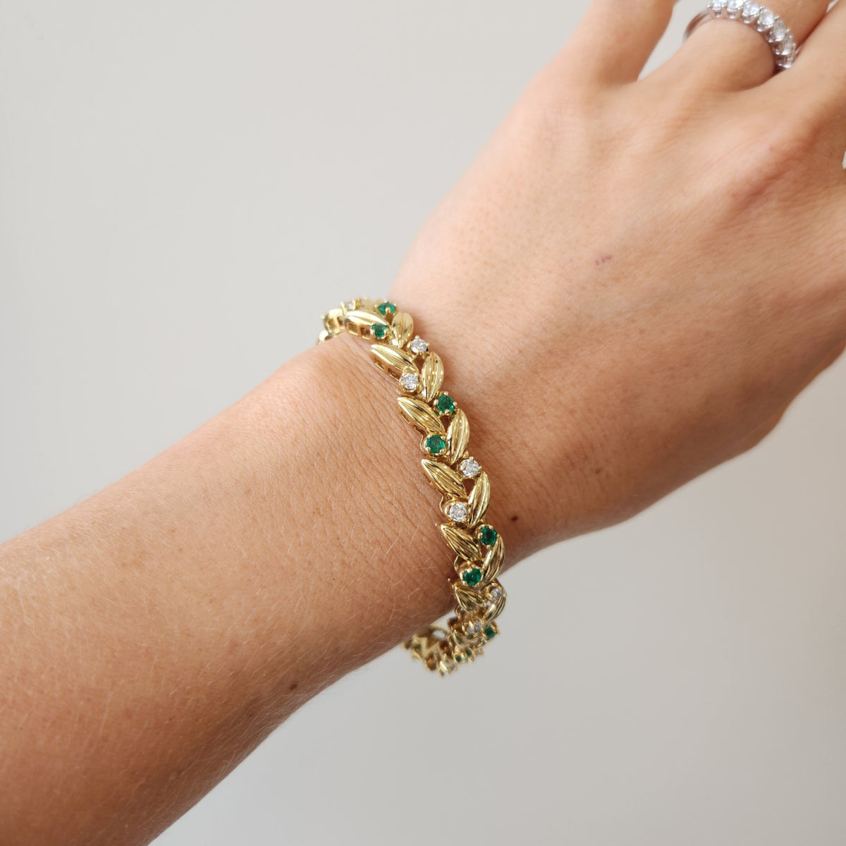 Vintage 18 Karat Yellow Gold Diamond And Emerald Leaf Pattern Bracelet, 7"