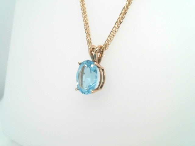 14 Karat Yellow Gold Oval Blue Topaz 4 Prong Set Solitaire Pendant